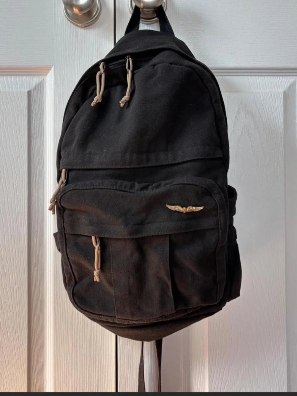 Black Canvas Backpack with Wing Emblem